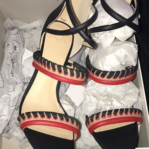 Black,red and tan size 11 stiletto sandal.